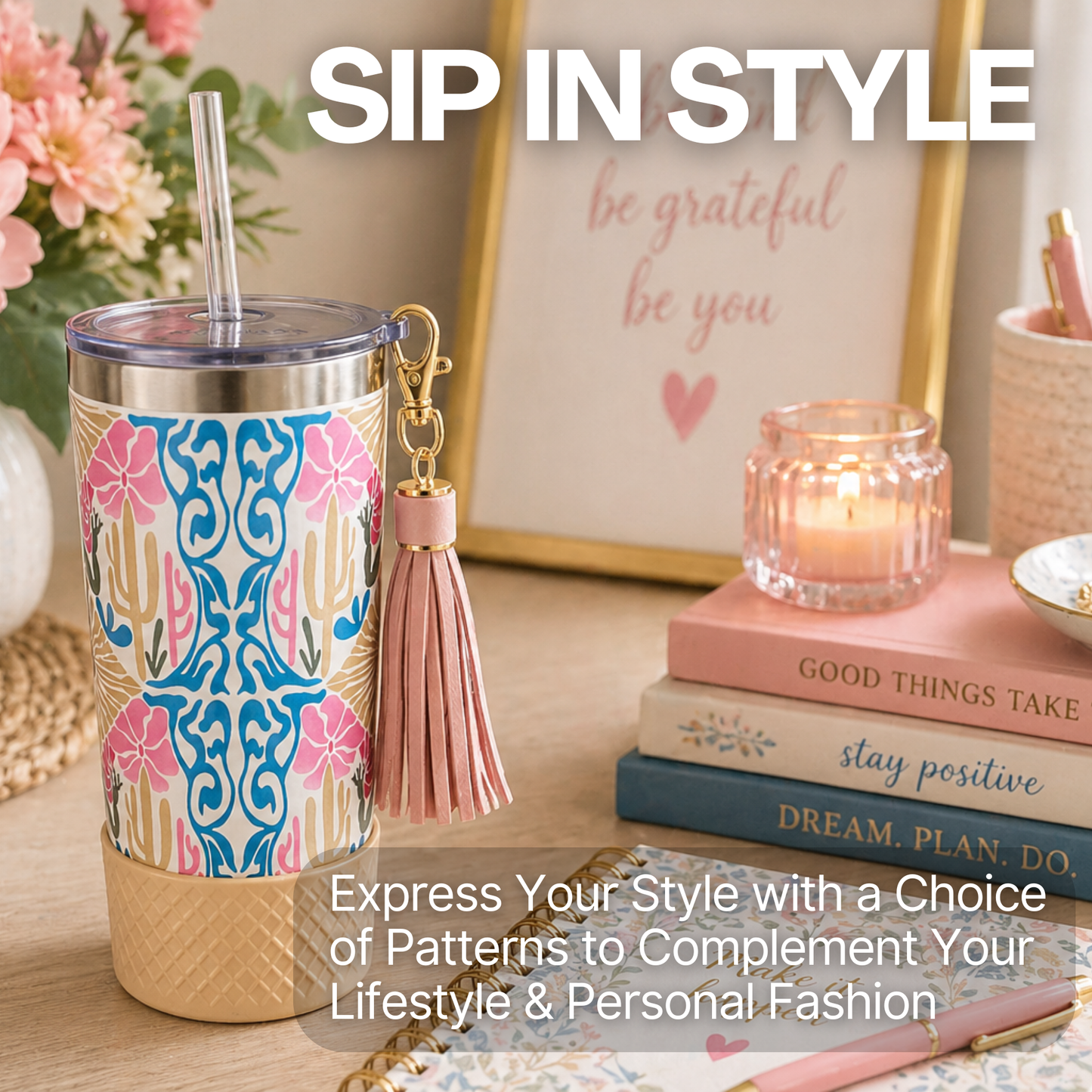Biddlebee 20oz straw charm tumbler with a tassel on a table with books and a candle, featuring 'Sip in Style' text.
