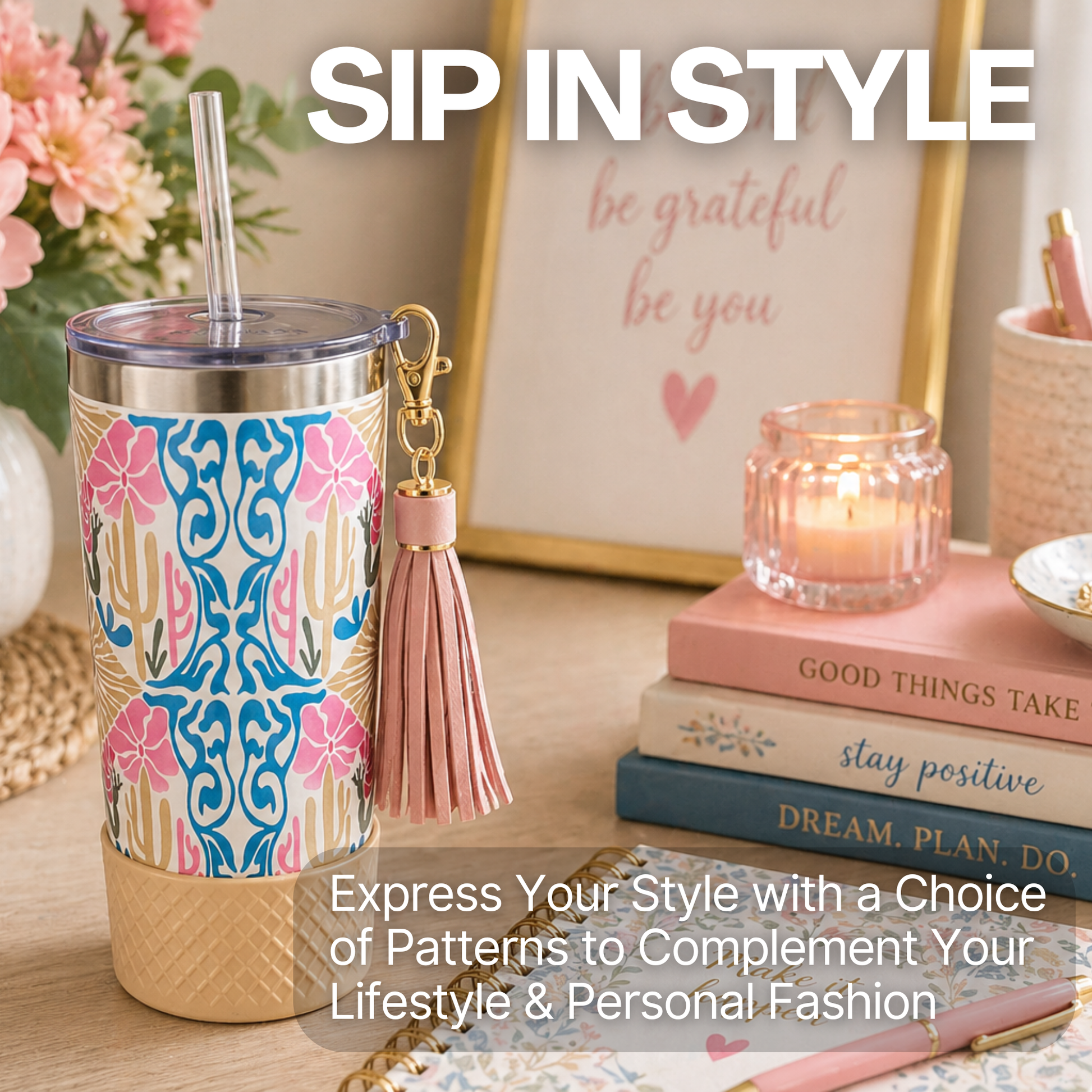 Biddlebee 20oz straw charm tumbler with a tassel on a table with books and a candle, featuring 'Sip in Style' text.