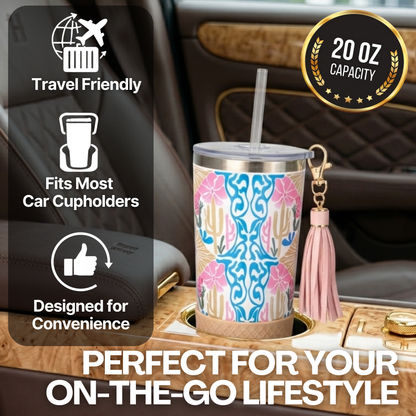 Biddlebee 20oz charm tumbler with pink tassel on car cup holder, travel-friendly features displayed.