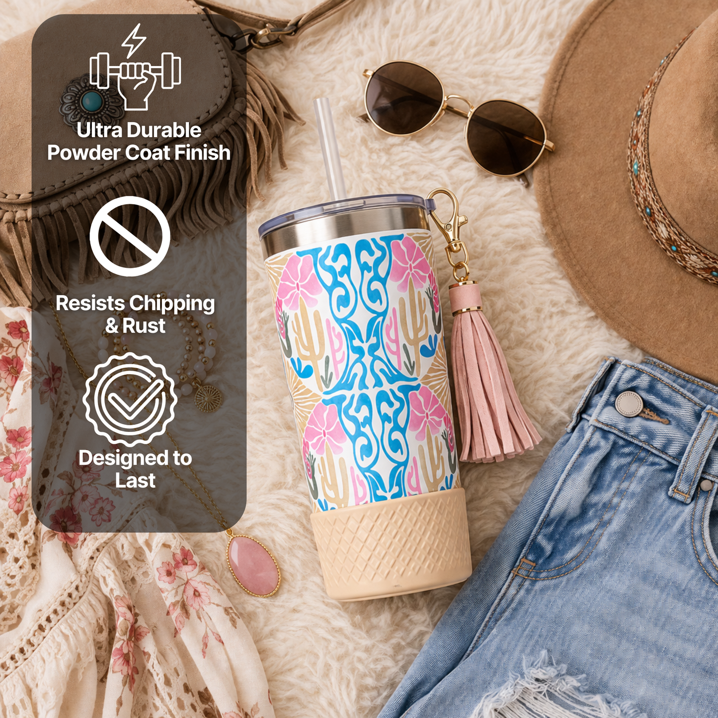 Biddlebee 20oz signature charm tumbler with desert dreams pattern, sunglasses, hat, and denim on textured surface with durability features displayed.