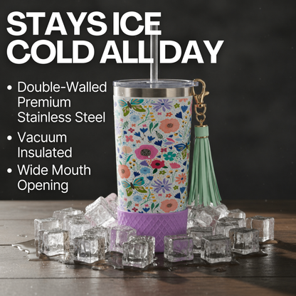 Biddlebee 20oz butterfly and Floral-patterned charm tumbler  with ice cubes and text highlighting features on a dark background