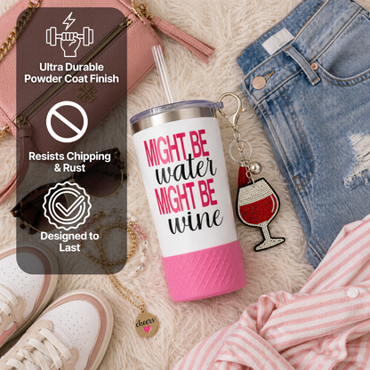 Biddlebee 20oz charm straw tumbler with 'Might be water might be wine' text, surrounded by casual items on a soft surface.