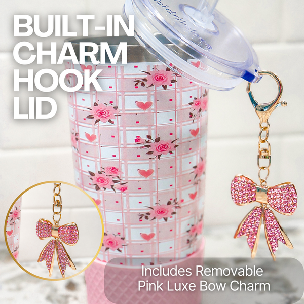 Biddlebee 20oz Pink Roses Charm straw tumbler with pink crystal tumbler charm and pink silicone boot with a built-in charm hook lid and pink bow charm.