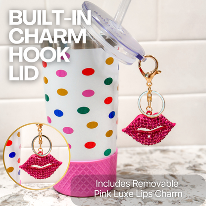 Biddlebee 20oz Polka dot charm tumbler with a built-in charm hook lid and pink lips charm on a marble surface.