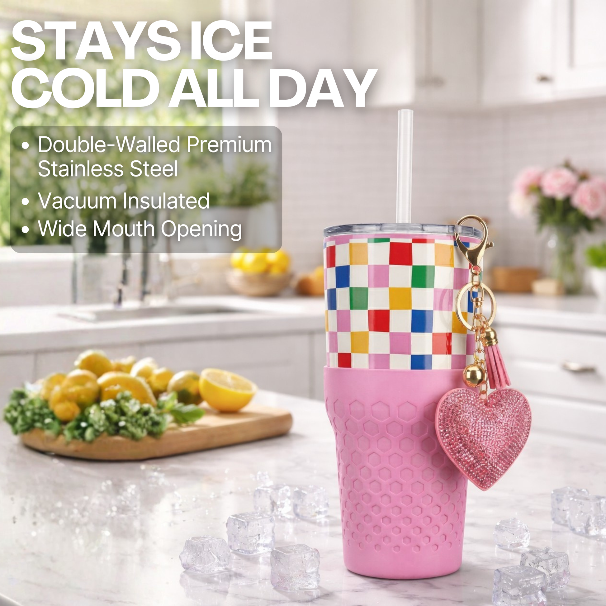 Biddlebee 30oz Happy Check Charm tumbler with easy sip straw, shimmer heart charm and silicone boot on a kitchen counter.