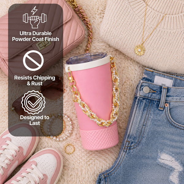 Biddlebee Brew Pink Tumbler features on a cozy background with a shirt shoes bracelet and purse 