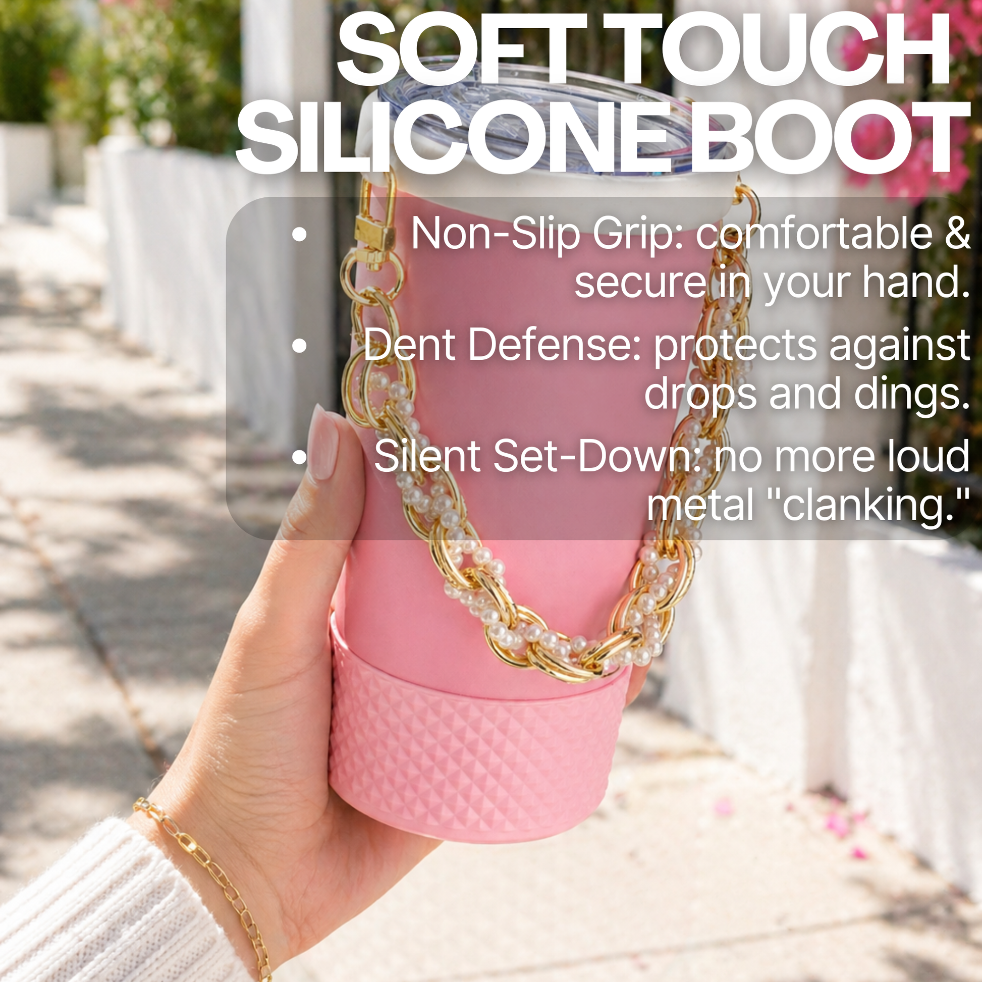 Biddlebee Brew Pink Tumbler being held by a person featuring the soft touch silicone boot