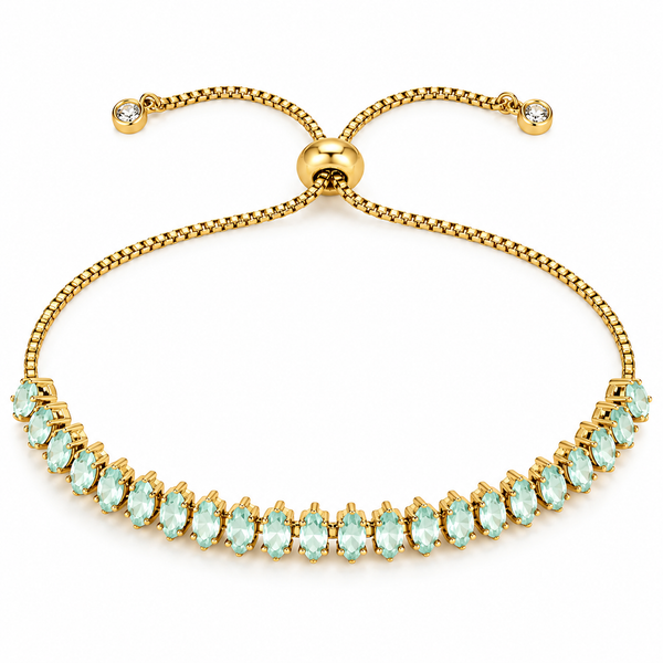 A gold-tone adjustable bracelet featuring a curved row of marquise-cut light blue gemstones, accented with two small clear stones at the ends of the sliding chain, set against a plain white background.