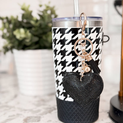 Biddlebee 20oz black and white charm tumbler with easy sip straw, shimmer heart tassel charm, protective silicone boot