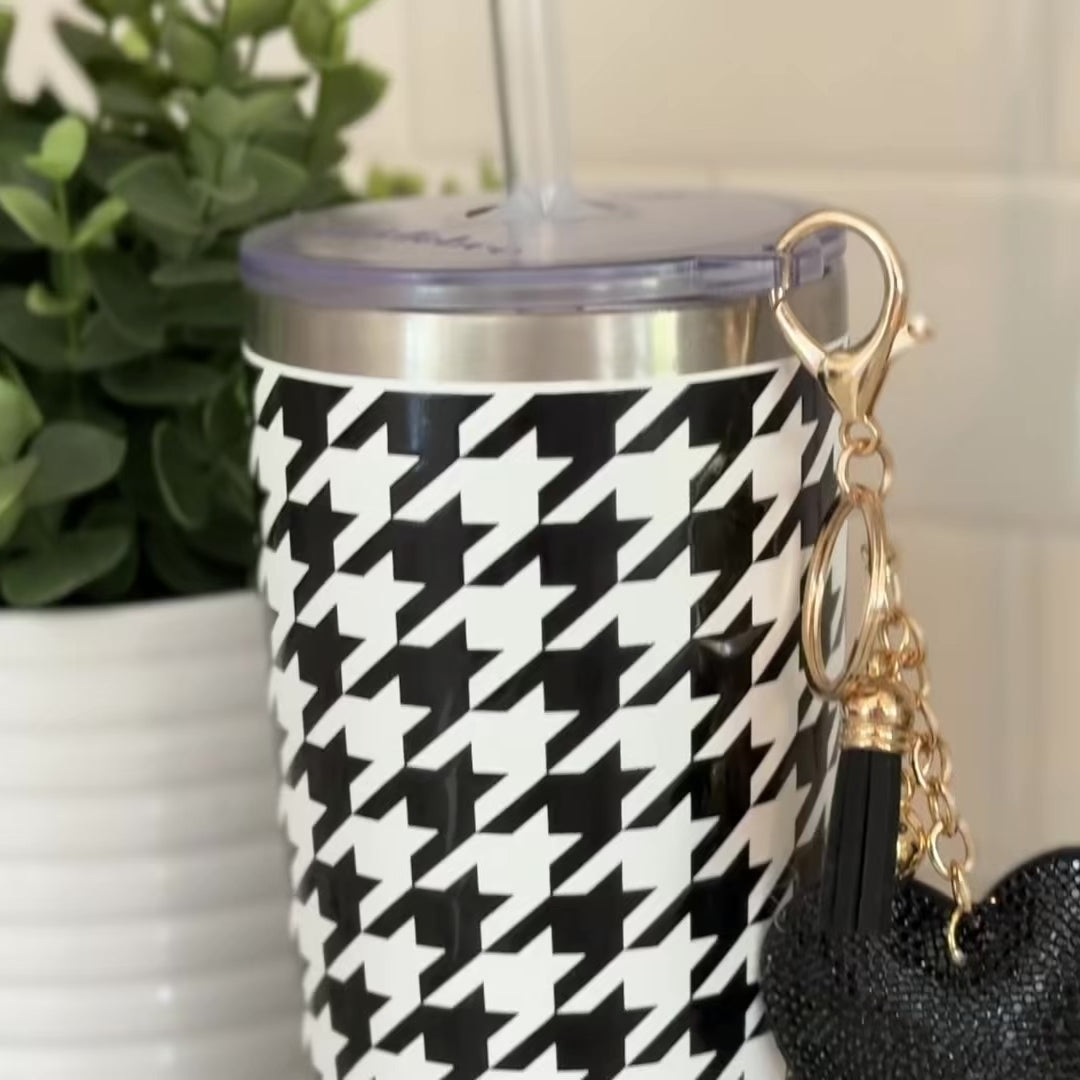 Biddlebee 20oz black and white charm tumbler with easy sip straw, shimmer heart tassel charm, protective silicone boot